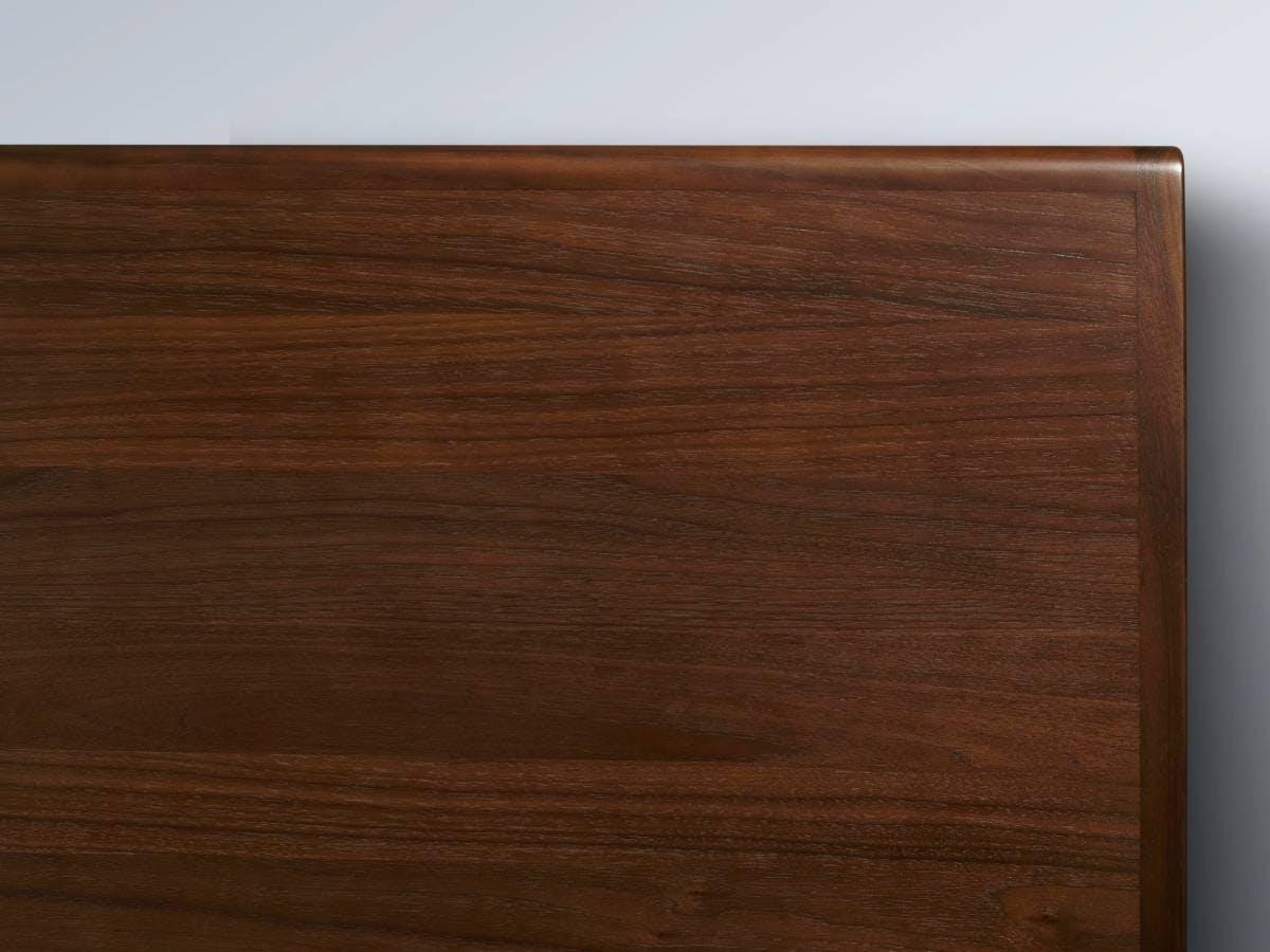 A close-up of the Baker bedhead in American Walnut.