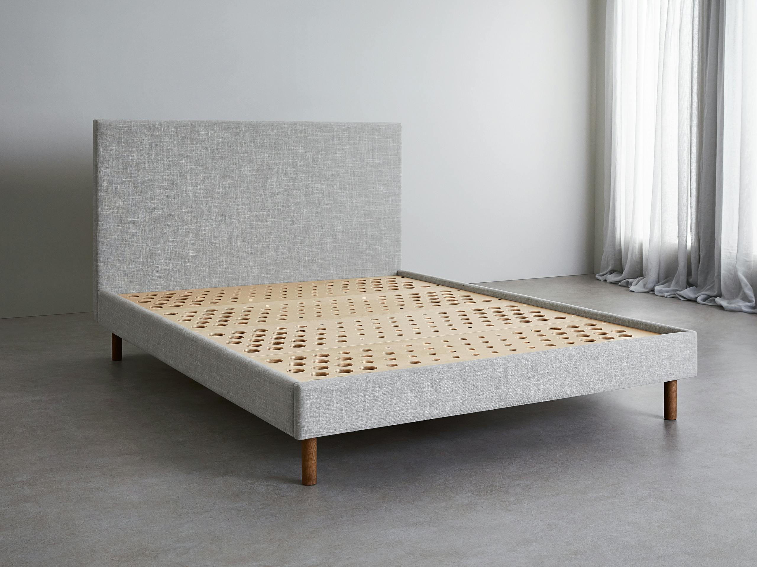 A light grey SD Indestruct Bed bed frame in a three quarter view.