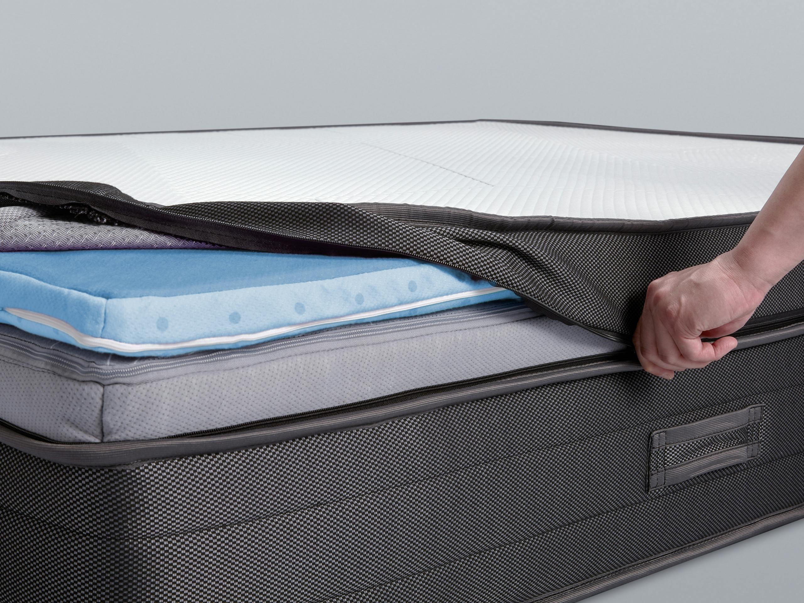 SD Mach 2 Mattress BreatheTech Cover being unzipped, revealing the AntiGravity Surface Foam and ComponentAdapt layers within.