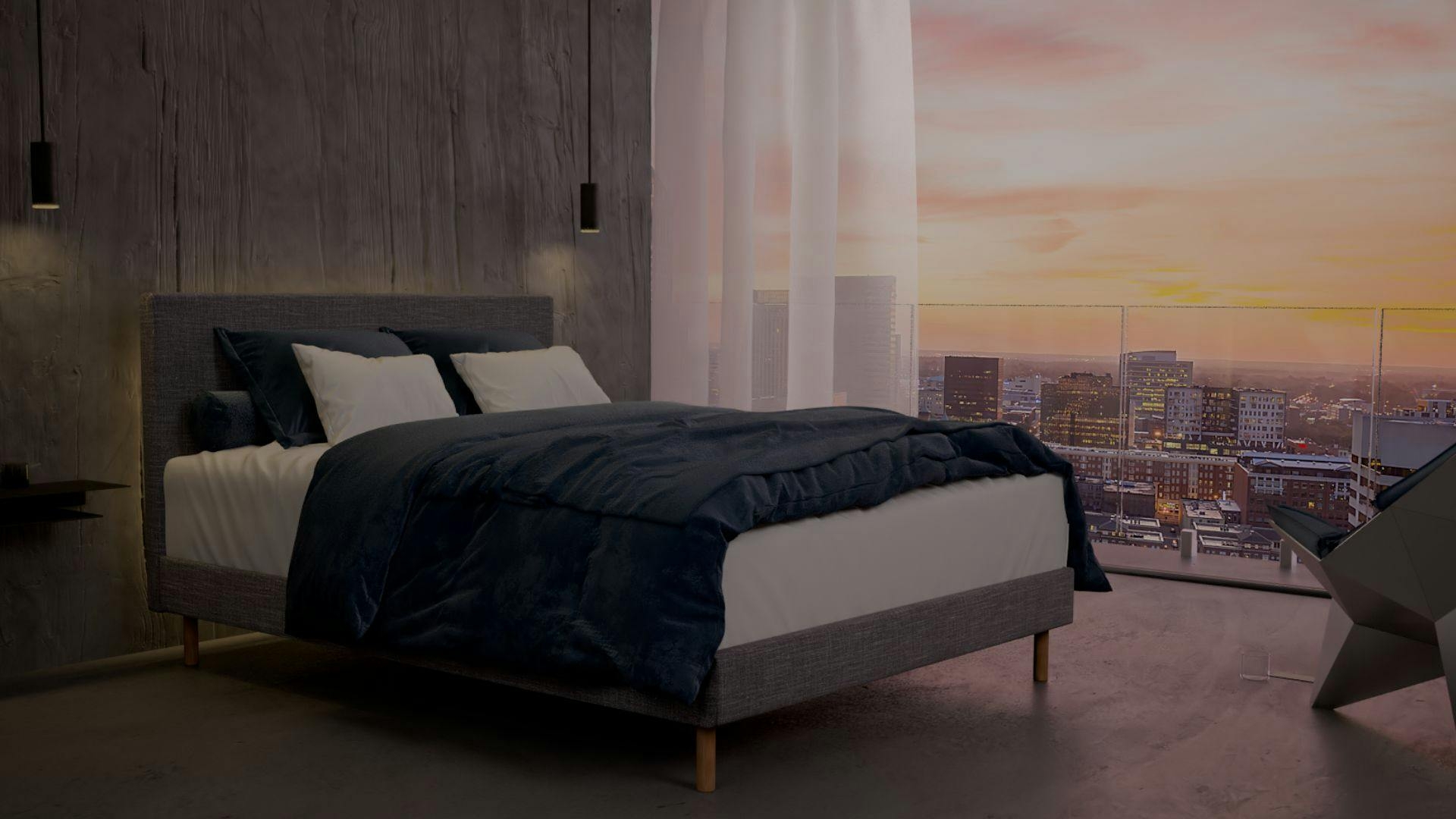 The Boyd SD Indestruct Bed in Charcoal, in an industrial bedroom overlooking a morning city skyline.